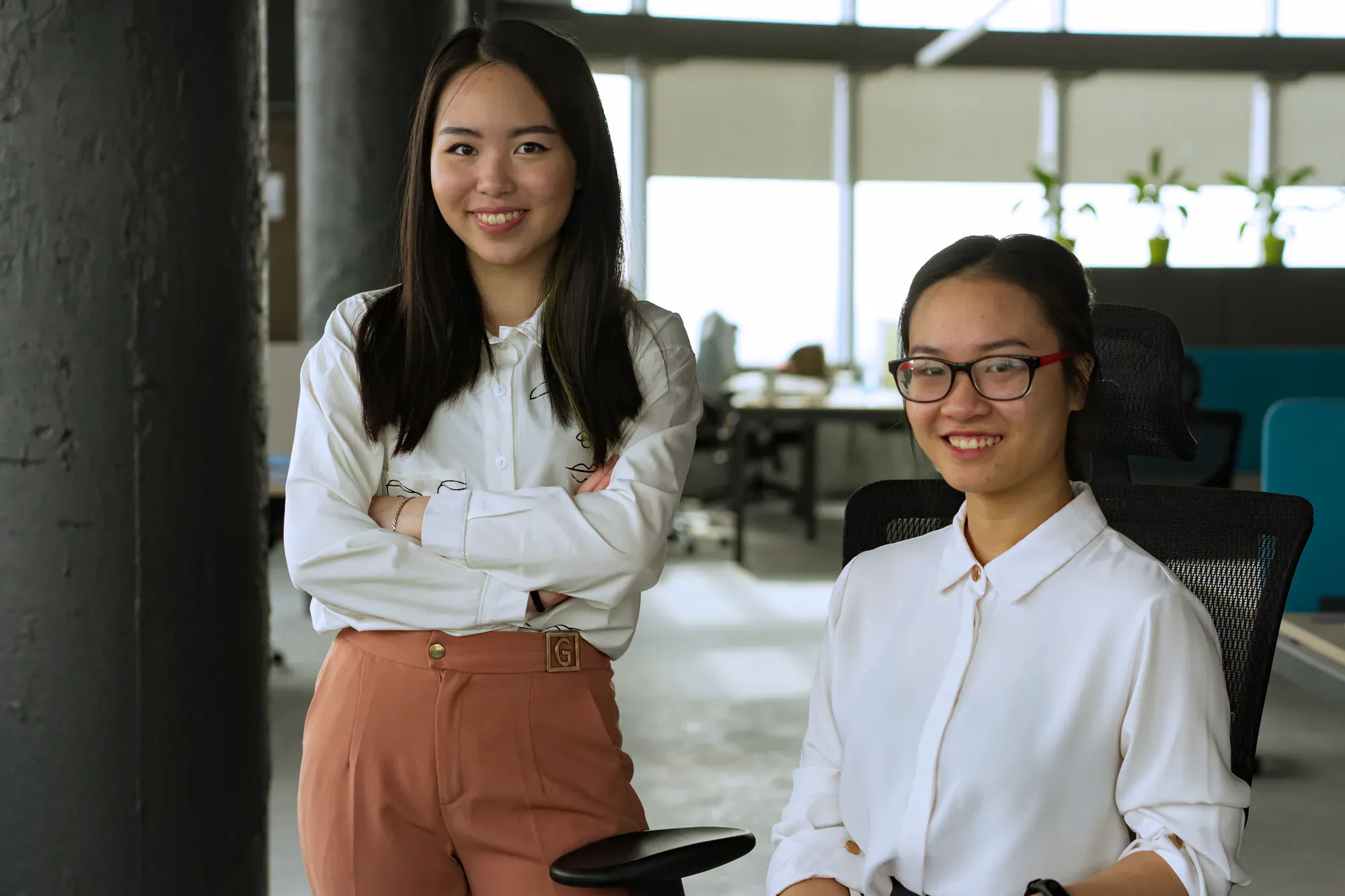 Two colleagues in a modern office