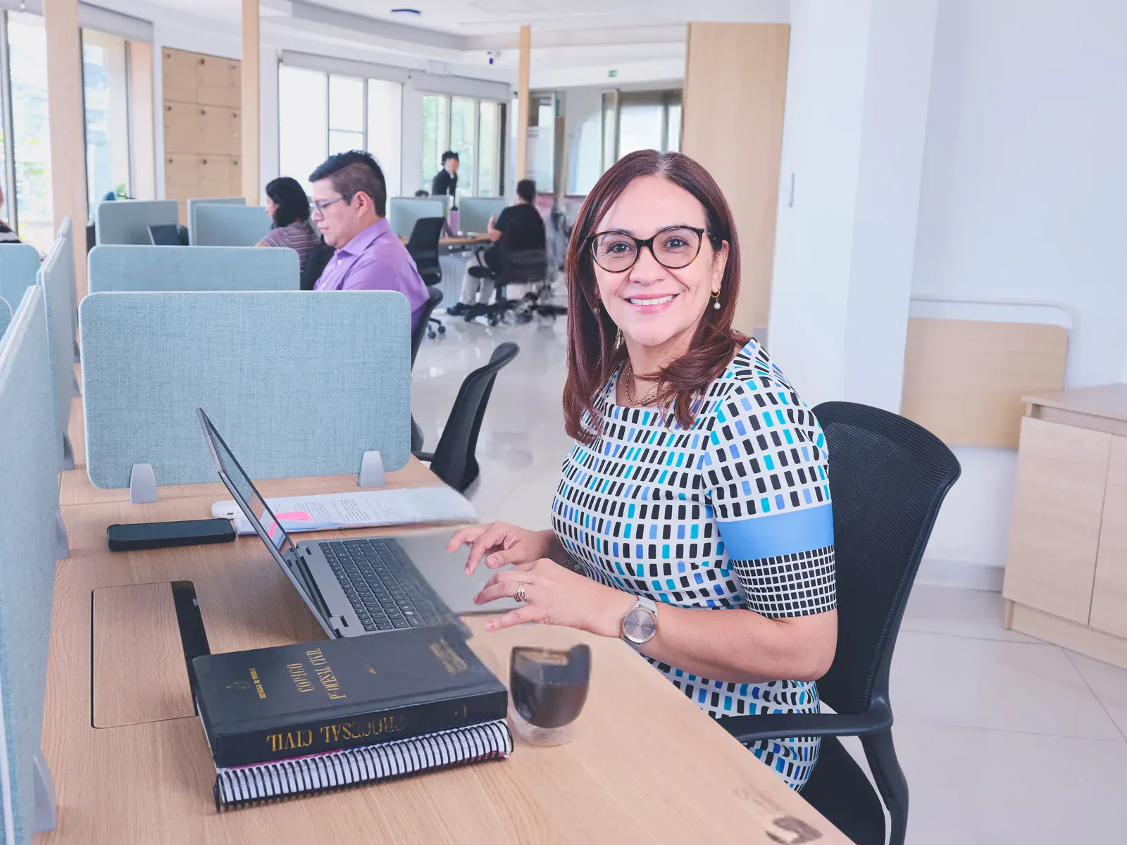 Businesswoman working at a laptop in an office