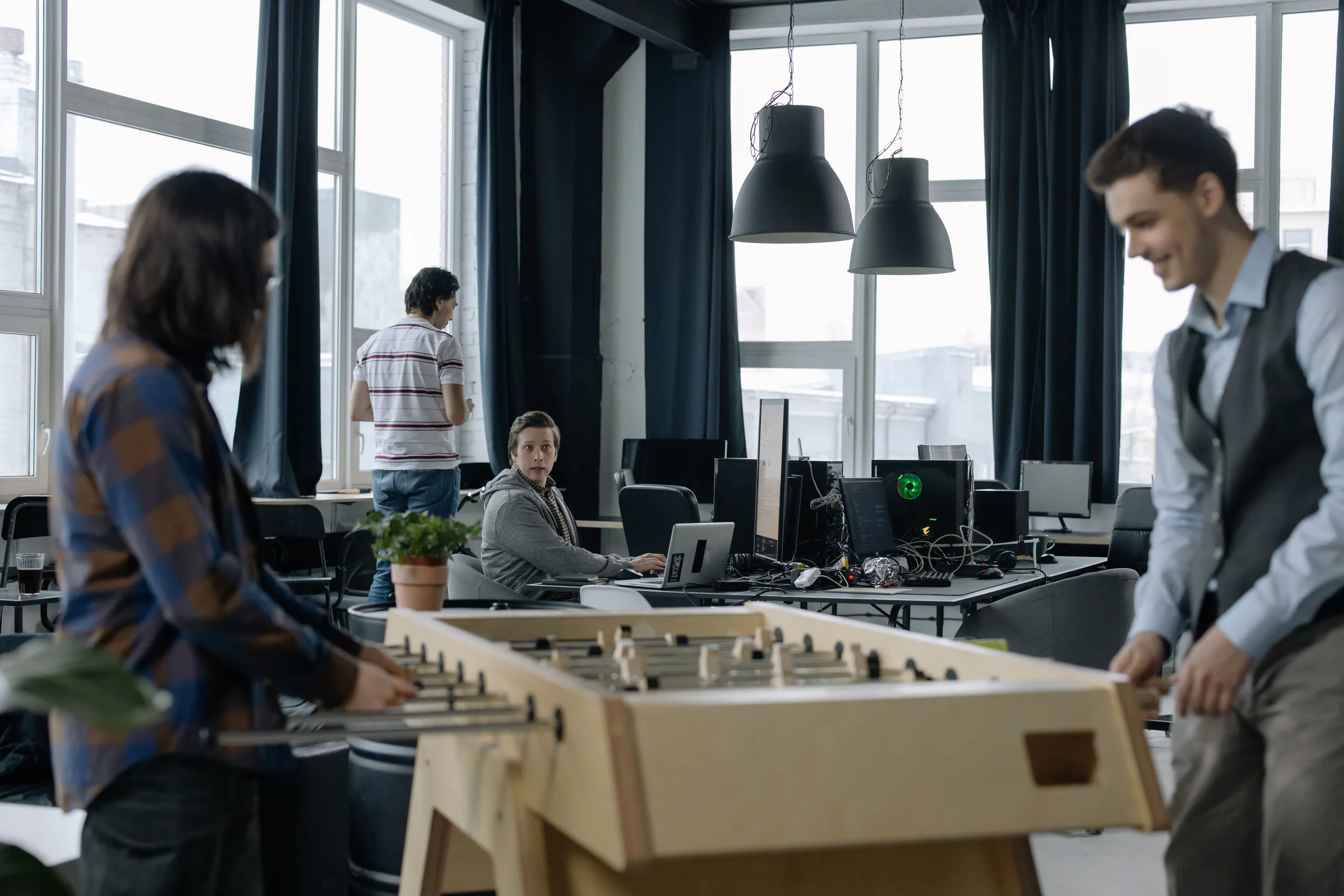 A remote digital team working together in a shared studio