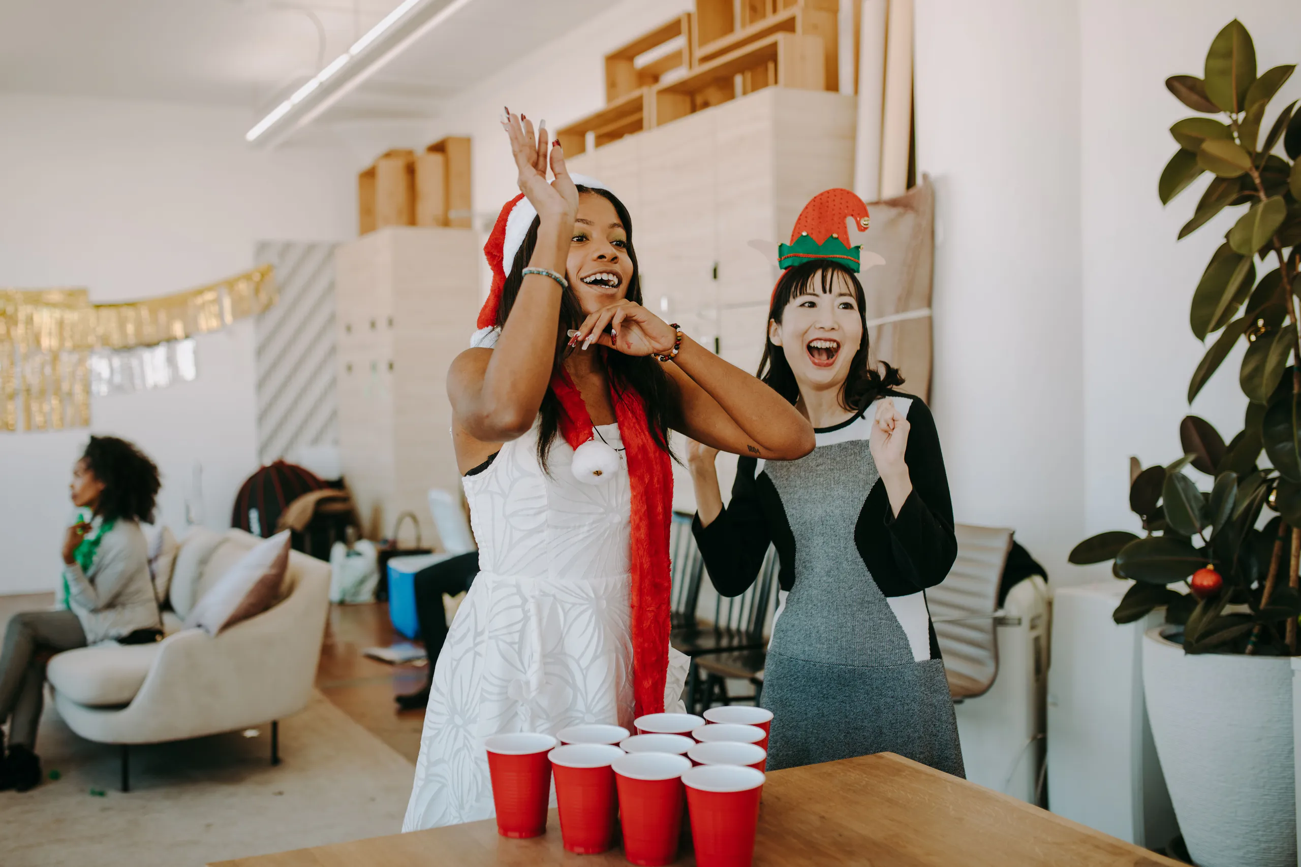 Colleagues enjoying a team game in the studio